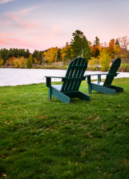 Adirondack chairs on the lakeshore